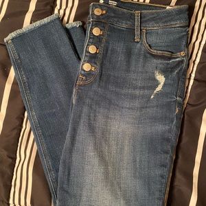 Button front skinny jeans